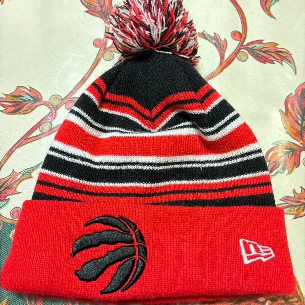 NEW ERA NBA TORONTO RAPTORS POM BEANIE STRIPED ADULT HAT RED BLACK MENS